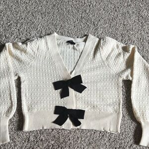 Express Cream Cardigan with Black Bows